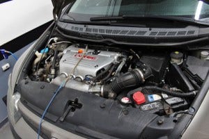 Honda Civic strapped to Dynojet for intake testing 