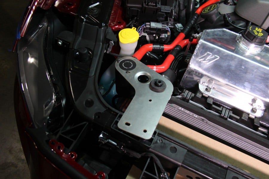 Mustang catch can bracket installed with other Mustang parts