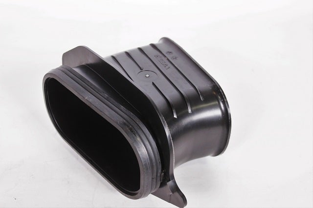 Components of stock Nissan Titan air intake